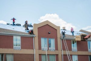 commercial worker roofing bowie roof |